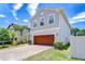 Charming two-story home boasts a brick driveway and a well-maintained landscaped yard at 828 Terra Vista St, Brandon, FL 33511