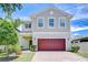 Charming two-story home boasts a brick driveway and a well-maintained landscaped yard at 828 Terra Vista St, Brandon, FL 33511