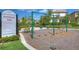 Community playground with swings offers outdoor recreation for residents and their families at 828 Terra Vista St, Brandon, FL 33511