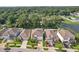 An aerial view of the homes and their lawns in this quiet neighborhood at 8305 Praise Dr, Tampa, FL 33625