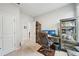 Functional home office space with a desk, chair, and shelving unit at 8305 Praise Dr, Tampa, FL 33625