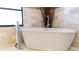 Luxurious bathroom features a standalone tub and elegant tile work at 8901 Eagle Watch Dr, Riverview, FL 33578