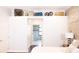 This room features a view into the main bathroom, and a decorative shelf along the back wall at 8901 Eagle Watch Dr, Riverview, FL 33578