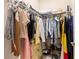 Walk-in closet features ample shelving and storage space for clothes and accessories at 9275 Bella Vita Cir, Land O Lakes, FL 34637