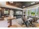 Modern community center offers stylish lounge areas, table games, and cozy seating for residents at 9275 Bella Vita Cir, Land O Lakes, FL 34637