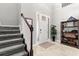 Entryway with staircase, and neutral décor and tile flooring at 9275 Bella Vita Cir, Land O Lakes, FL 34637