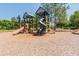 Playground with slides, climbing structures, and covered areas provides a fun, safe outdoor recreation area for community residents at 9275 Bella Vita Cir, Land O Lakes, FL 34637