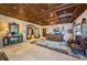 Elegant clubhouse lobby with travertine floors, dark wood millwork, and reception desk at 9808 Milano Dr, Trinity, FL 34655