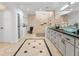 Modern bathroom with a walk-in shower and dual vanity at 13710 Westshire Dr, Tampa, FL 33618