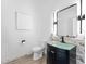 Stylish half bath featuring a vessel sink and modern fixtures at 13710 Westshire Dr, Tampa, FL 33618
