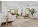 Living room showcasing stylish furniture, natural light, and an inviting open-concept layout at 13710 Westshire Dr, Tampa, FL 33618