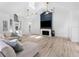 Living room with a brick fireplace and modern decor at 13710 Westshire Dr, Tampa, FL 33618