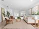 Inviting living room featuring a neutral color palette, stylish decor, and an open layout for easy flow at 13710 Westshire Dr, Tampa, FL 33618