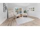 Bright living room featuring minimalist decor and a neutral color scheme, creating a welcoming atmosphere at 13710 Westshire Dr, Tampa, FL 33618