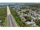Scenic aerial view of a waterfront community, showcasing lush greenery and proximity to the ocean at 14030 79Th Ave, Seminole, FL 33776