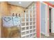 Walk in shower with light tile walls and glass brick partition wall at 14030 79Th Ave, Seminole, FL 33776