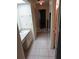 Bathroom features a vanity with a large mirror and a skylight, offering natural light at 14442 Reuter Strasse Cir # 812, Tampa, FL 33613