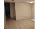 Neutral room with tile floors and natural light, perfect for relaxing or entertaining at 14442 Reuter Strasse Cir # 812, Tampa, FL 33613