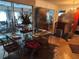 Elegant dining room featuring a glass-top table, unique decor, and ample natural light at 1448 Temple St, Clearwater, FL 33756