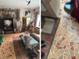 Spacious living room with a rug, a sofa, and a view to the television at 1448 Temple St, Clearwater, FL 33756