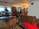 Bright and airy living space with stylish furnishings and decor throughout the dining and living rooms at 1448 Temple St, Clearwater, FL 33756