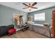 Bright, modern bedroom features hardwood floors, natural light, and plenty of closet space at 1485 Lakeview Rd # 2, Clearwater, FL 33756