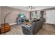 Cozy living room with wood flooring, and comfortable leather furnishings at 1485 Lakeview Rd # 2, Clearwater, FL 33756