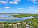Breathtaking view of waterfront homes, lush foliage, and bay waters at 1531 75Th Ne Cir, St Petersburg, FL 33702