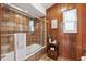 Bathroom with a shower and patterned tile at 1531 75Th Ne Cir, St Petersburg, FL 33702