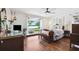 Serene bedroom with large windows overlooking a lake view, wood floors, and neutral decor for a relaxing retreat at 1531 75Th Ne Cir, St Petersburg, FL 33702