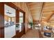 Upstairs hallway overlooking a living room with stone fireplace at 1531 75Th Ne Cir, St Petersburg, FL 33702
