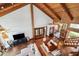 Open concept living and dining room with hardwood floors and vaulted ceiling at 1531 75Th Ne Cir, St Petersburg, FL 33702