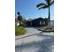 Charming single-story home with front lawn and mature landscaping at 15416 2Nd E St, Madeira Beach, FL 33708