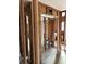 Interior view with exposed framing, a window, and view into other rooms at 15416 2Nd E St, Madeira Beach, FL 33708