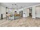 Spacious kitchen with a large island, stainless steel appliances, and ample cabinet space at 1669 Feather Grass Loop, Lutz, FL 33558