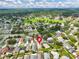 Aerial view of neighborhood, pinpointing home near green spaces and amenities at 1706 Erin Brooke Dr, Valrico, FL 33594