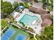 Aerial shot showcases the community pool, playground, and recreational area at 1706 Erin Brooke Dr, Valrico, FL 33594