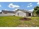 Private backyard with lawn and patio at 1706 Erin Brooke Dr, Valrico, FL 33594