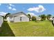 Large grassy backyard with privacy fence at 1706 Erin Brooke Dr, Valrico, FL 33594