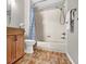 Full bathroom with tiled floors, shower, and vanity at 1706 Erin Brooke Dr, Valrico, FL 33594
