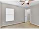 Bedroom with large window and access to walk-in closet at 1706 Erin Brooke Dr, Valrico, FL 33594
