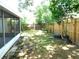 Fenced backyard has both a shed and a patio at 2114 Intervista Ln, Valrico, FL 33594