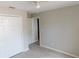 A bedroom featuring wood-look floors and closet at 2114 Intervista Ln, Valrico, FL 33594