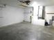 An attached two car garage provides a convenient and secure space for parking and storage at 2114 Intervista Ln, Valrico, FL 33594