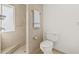 Modern bathroom with a walk-in shower and tiled walls at 2320 Harn Blvd, Clearwater, FL 33764