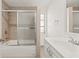 Modern bathroom featuring a shower/bathtub combo and a vanity at 2320 Harn Blvd, Clearwater, FL 33764