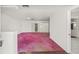 Spacious living room featuring ample natural light, and a sliding glass door at 2320 Harn Blvd, Clearwater, FL 33764