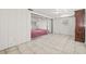 Additional tile-floored room with a sliding door leading to another room at 2320 Harn Blvd, Clearwater, FL 33764