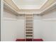Bright, walk-in closet with shelving and hanging space at 2320 Harn Blvd, Clearwater, FL 33764