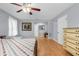 Bright and airy bedroom with light-colored walls and a comfortable bed at 23327 Christian Cir, Brooksville, FL 34601